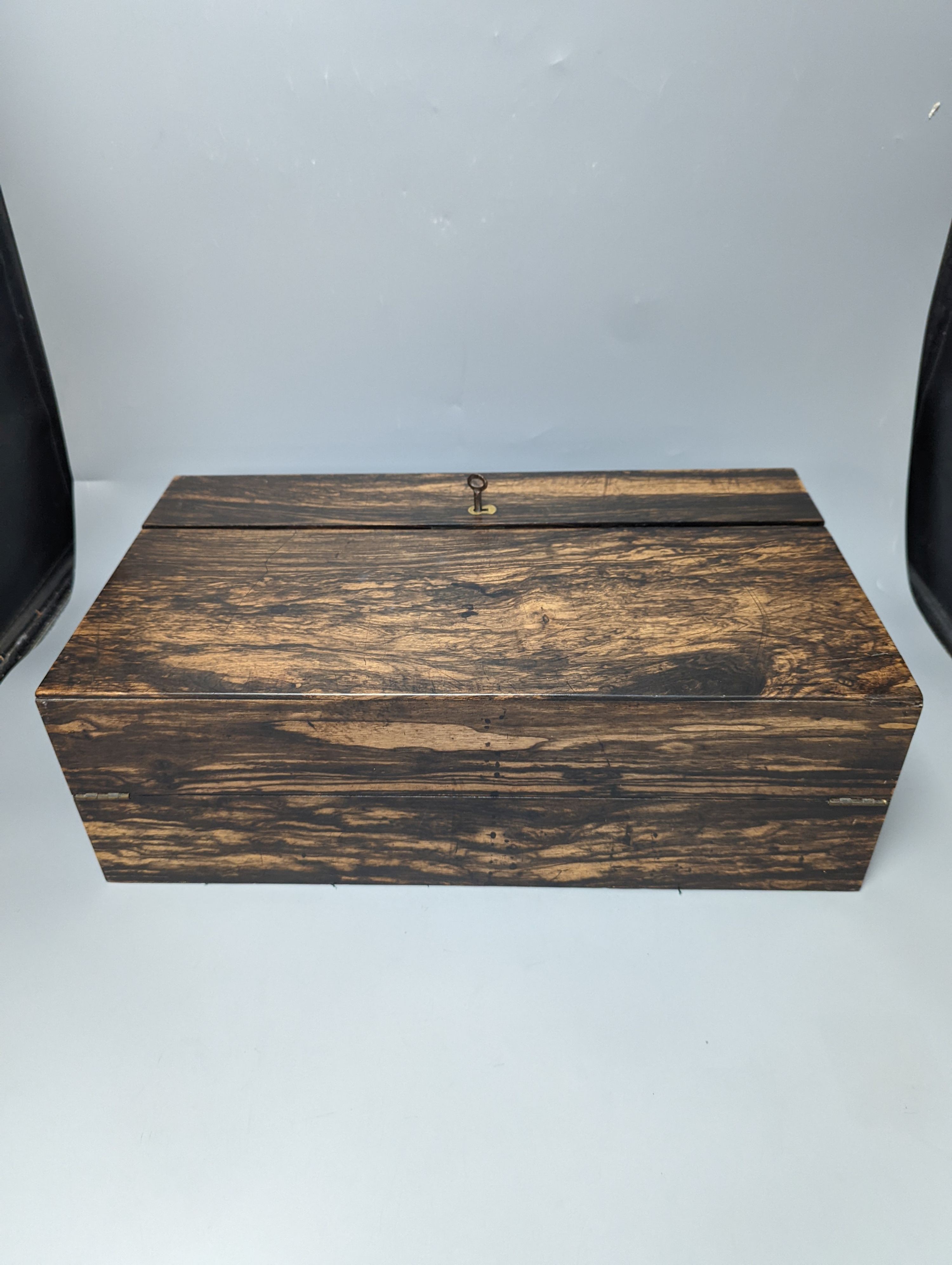 A 19th Anglo-Indian coromandel writing slope, with harlequin action compartmentalised superstructure, 45cm wide